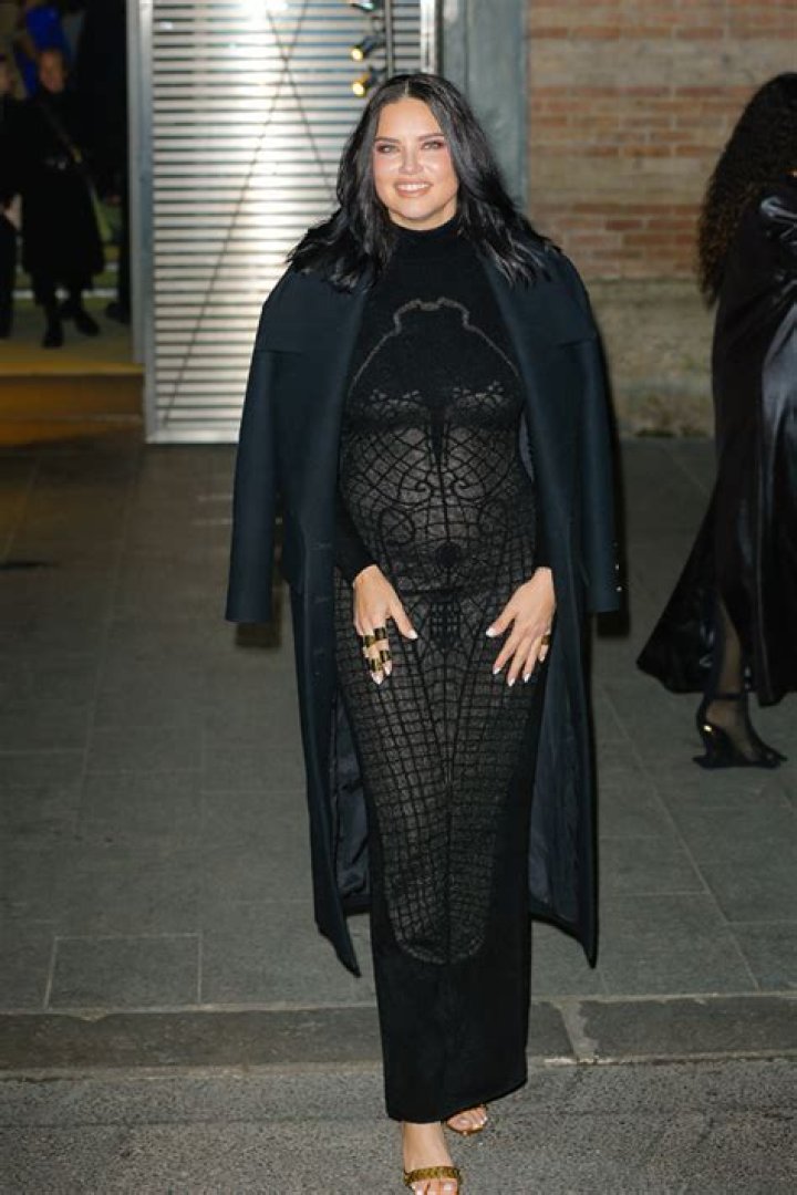 Adriana Lima, 40, Shows Off Baby Bump In Sexy Sheer Dress At Paris Fashion Week