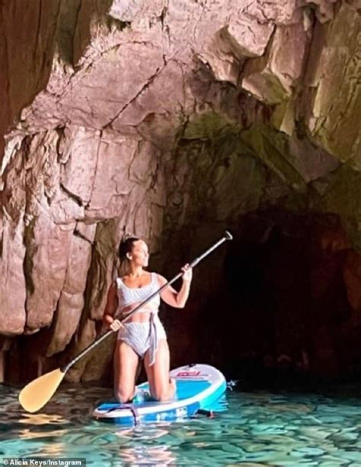 Alicia Keys Rocks A Bikini While Paddleboarding Through A French Sea Cave — Photos