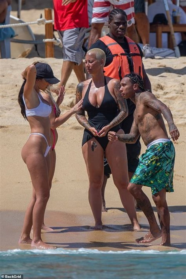 Amber Rose Rocks Black Swimsuit On Vacation With Tyga & Friends – Hollywood Life