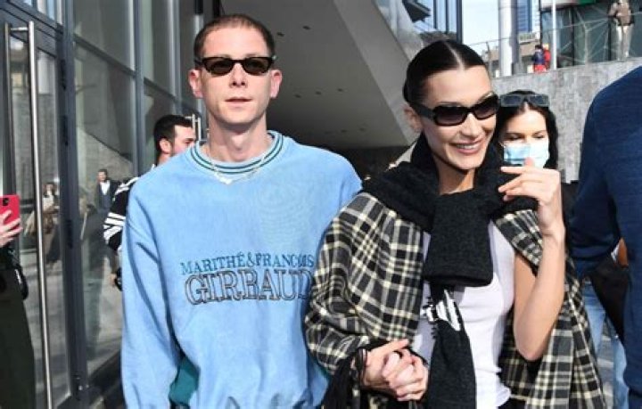 Bella Hadid Leaves Romantic Dinner Date With Mystery Man & Bouquet Of Flowers — Pics