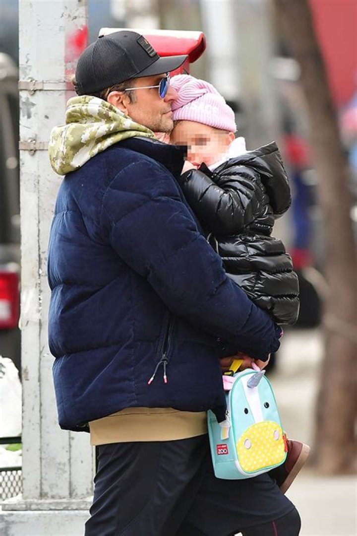 Bradley Cooper Is A Doting Dad While Carrying Tired Daughter Lea, 2, During NYC Stroll — Pic