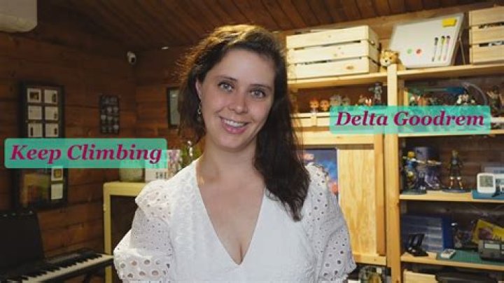 Artist Delta Goodrem ‘Strips Back Layers Of Herself’ & Reveals Battle With Cancer In New Project