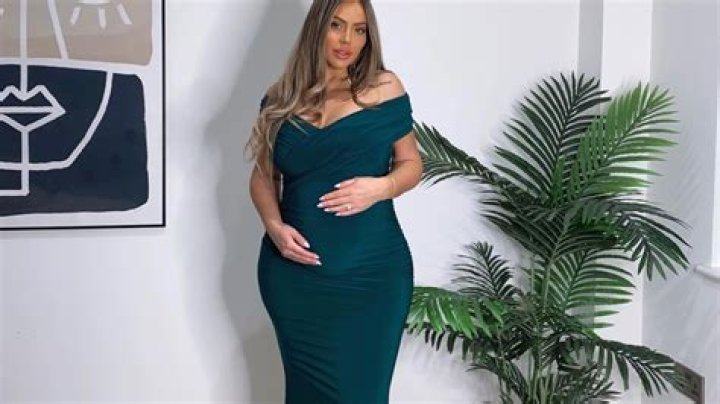 Pregnant Erica Mena Shows Off Her Baby Bump & Sexy Curves In Skintight Dress — New Pic