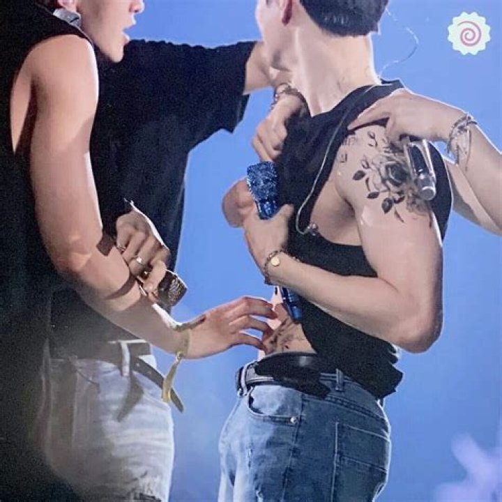 Exo’s Junmyeon Rips Off His Shirt Onstage To Reveal His Tattoo & Fans Are Melting — Watch