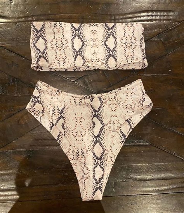 Hailey Baldwin & Bella Hadid Slip Into Animal Print Bikinis While On Italian Getaway