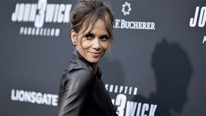 Halle Berry, 53, Reveals Insanely Toned Arms & Back While Showing Off Flexibility In Sports Bra