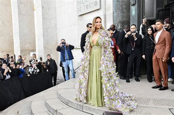 Jennifer Lopez Dazzles in Plunging Green Gown at Paris Fashion Week: Photos