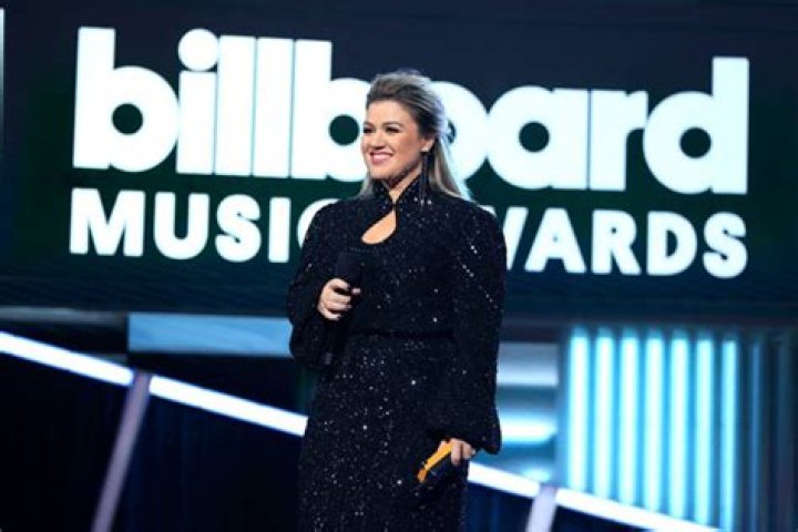 Photos Of The Host’s Outfits – Hollywood Life