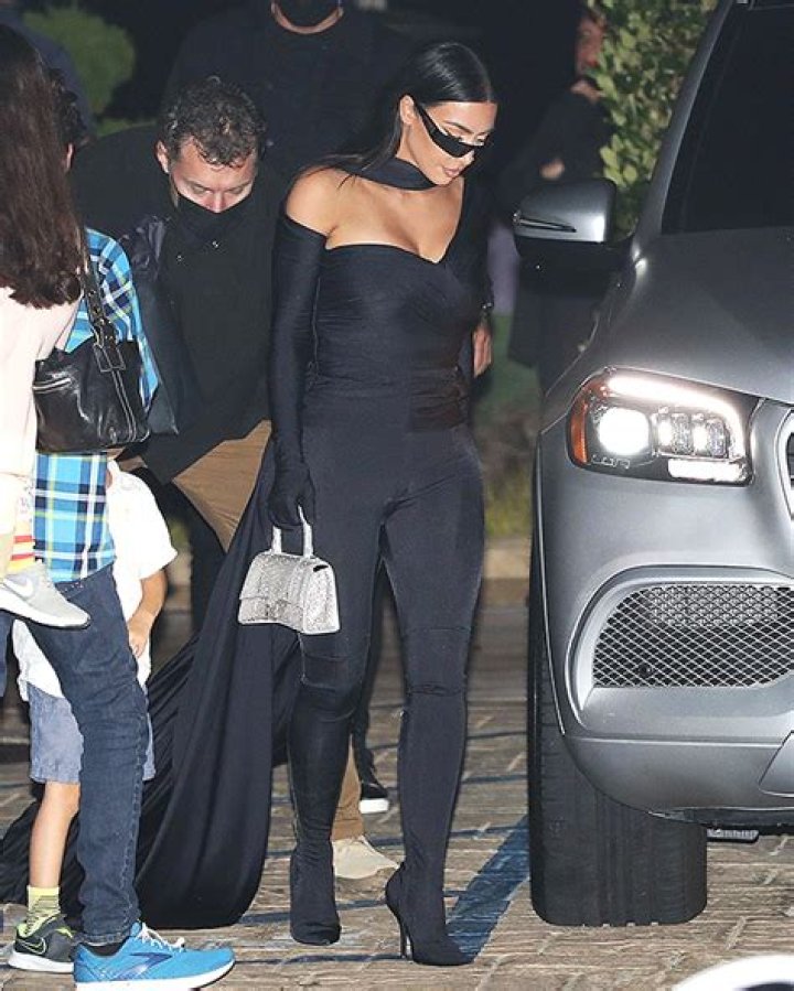 Kim Kardashian Rocks Skintight Black Jumpsuit With Long Cape: Pics – Hollywood Life