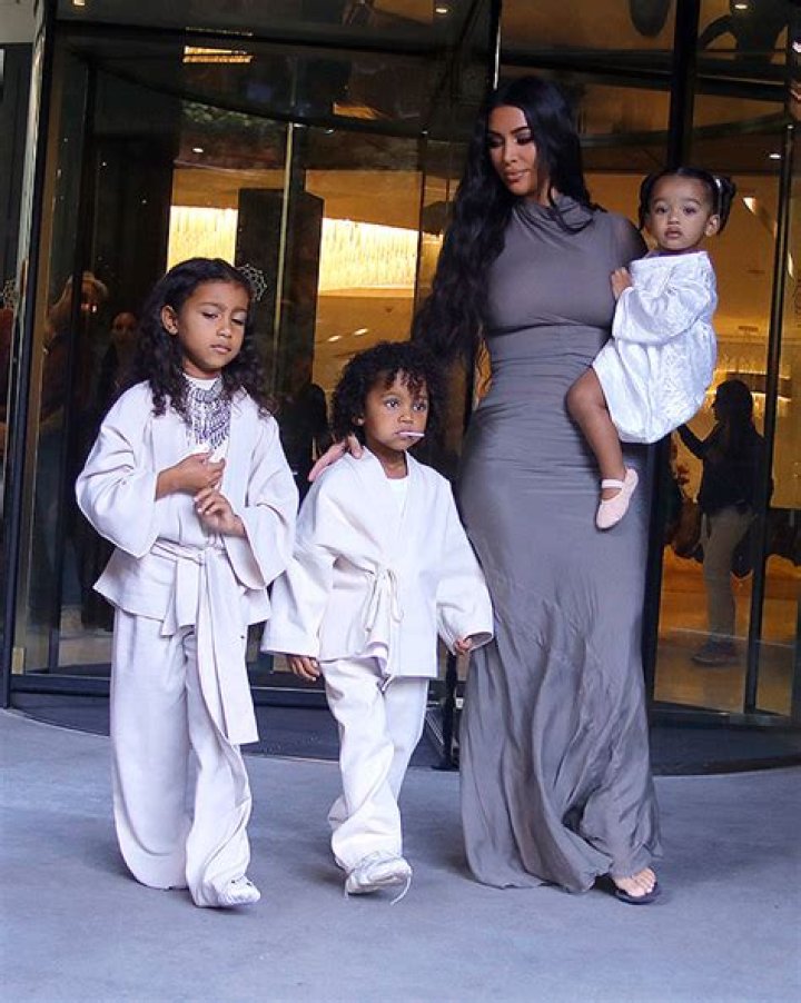 Kim Kardashian Snuggles Up To Saint, 7, & Chicago, 5, In Pool For ‘Sweet Kisses’