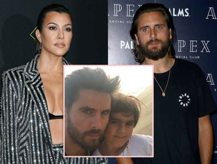Kourtney Kardashian Rocks A White Bodysuit & Tan Trousers With A Scott Disick Look-Alike
