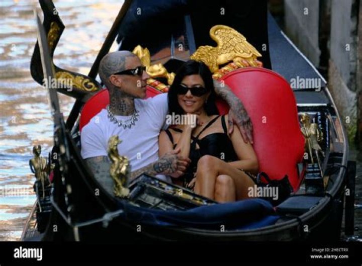 Kourtney Kardashian Sits on Travis Barker’s Lap As They Cozy Up For a Gondola Ride In Venice
