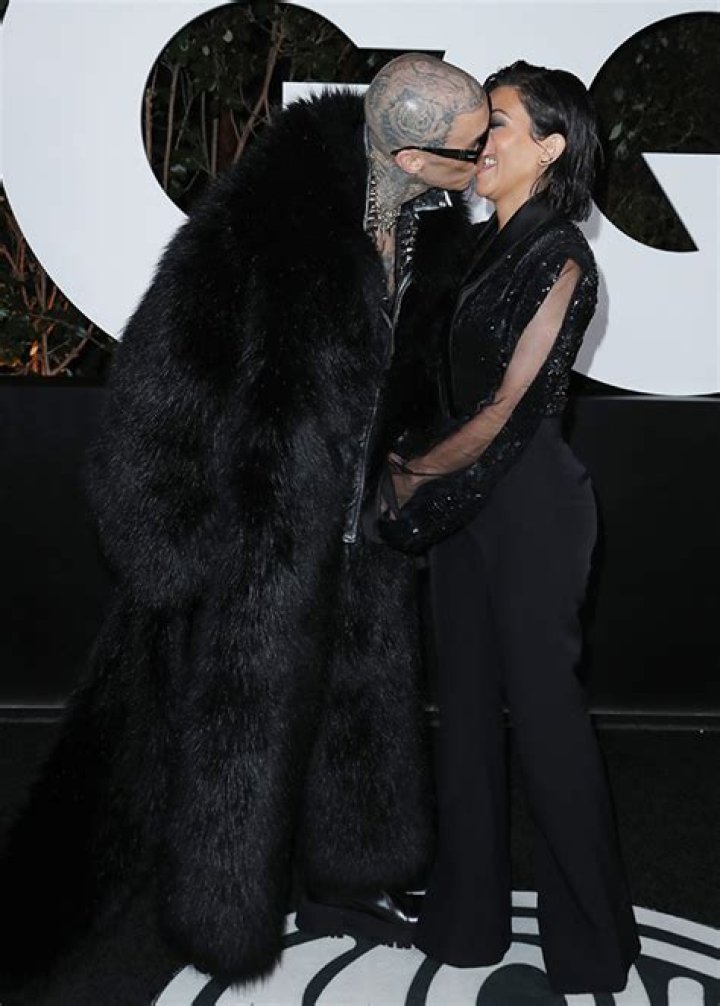 Kourtney Kardashian & Travis Barker Pack On The PDA At GQ Men Of The Year Party: Photos