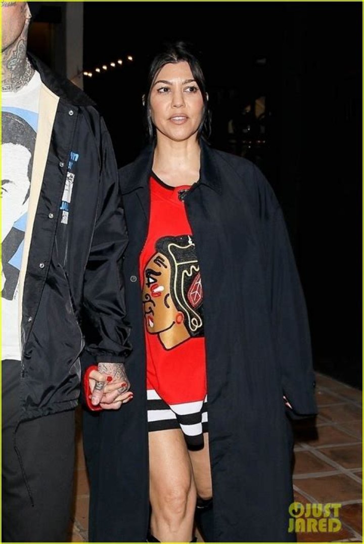 Kourtney Kardashian & Travis Barker Pack On PDA While Holding Hands In Milan
