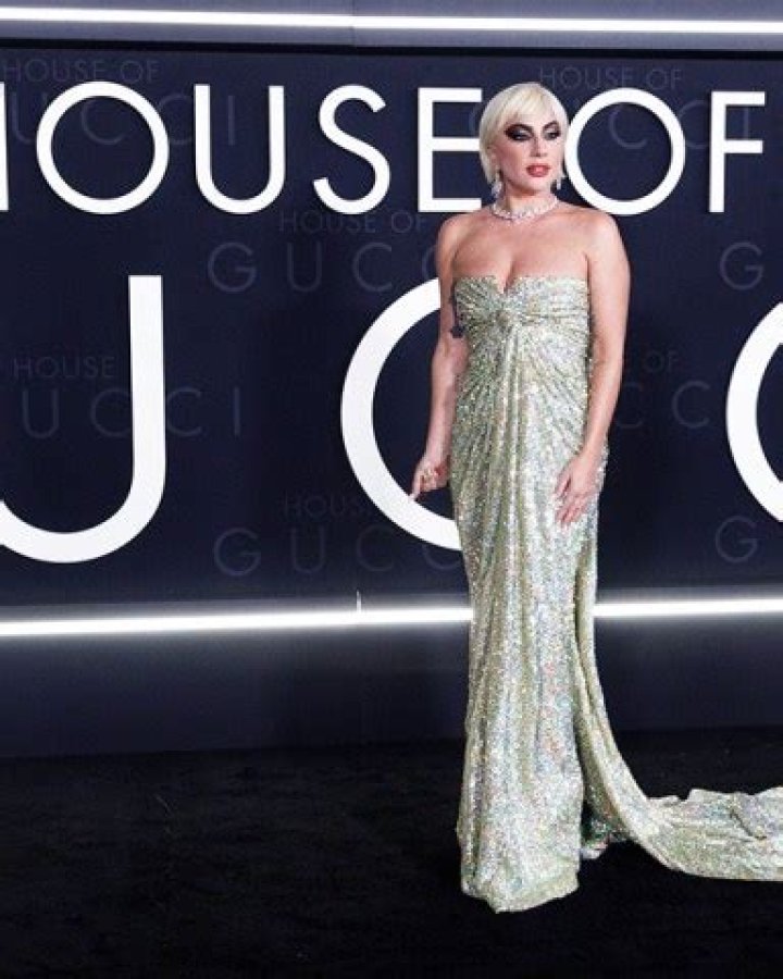 ​Lady Gaga Stuns In Sexy High Slit Dress While Promoting ‘House Of Gucci’ In London