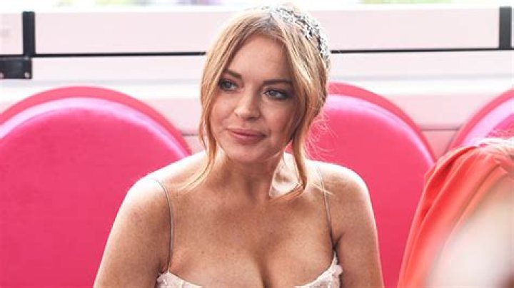 Lindsay Lohan Rocks A Pink Cover-Up While Lounging On A Hammock In The Maldives