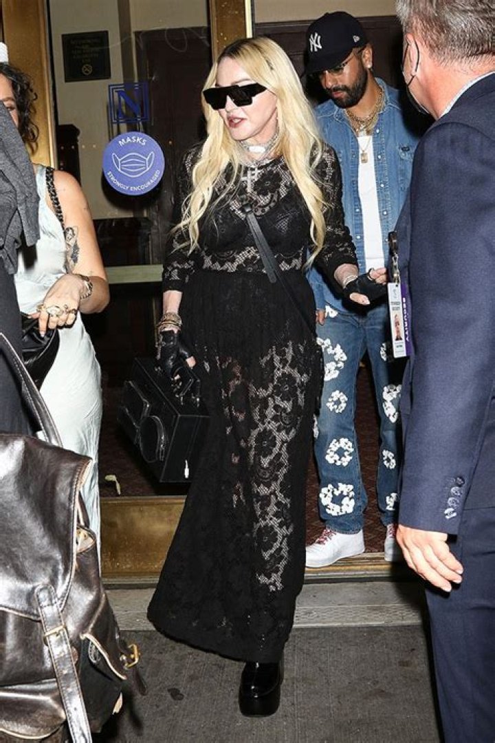 Madonna, 63, Wears Sheer Lace Dress & Reveals Black Lingerie Leaving ‘MJ: The Musical’: Photos