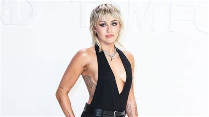 Miley Cyrus Looks Incredible In Low-Cut Tank Top While Makeup-Free In New Photos