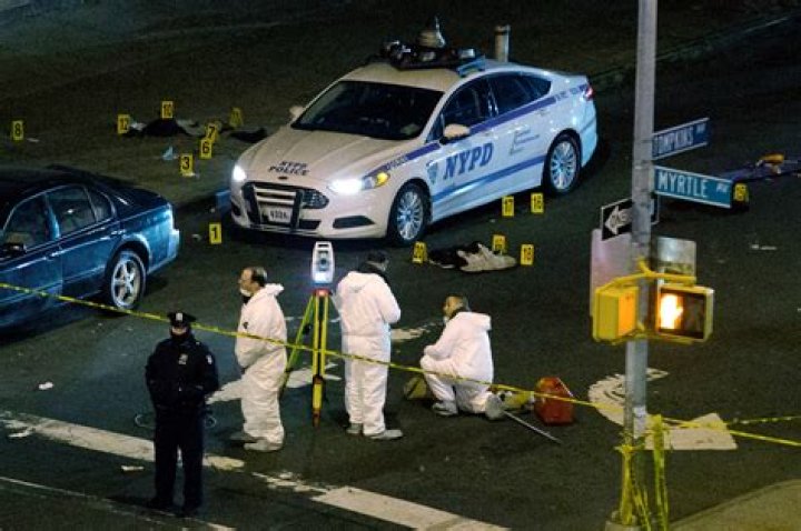 NYPD: Gunman Murders 2 Police Officers In Squad Car, Kills Himself