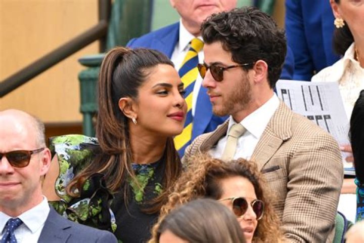 Priyanka Chopra Surprises A Shirtless Nick Jonas With New German Shepherd Puppy — Watch