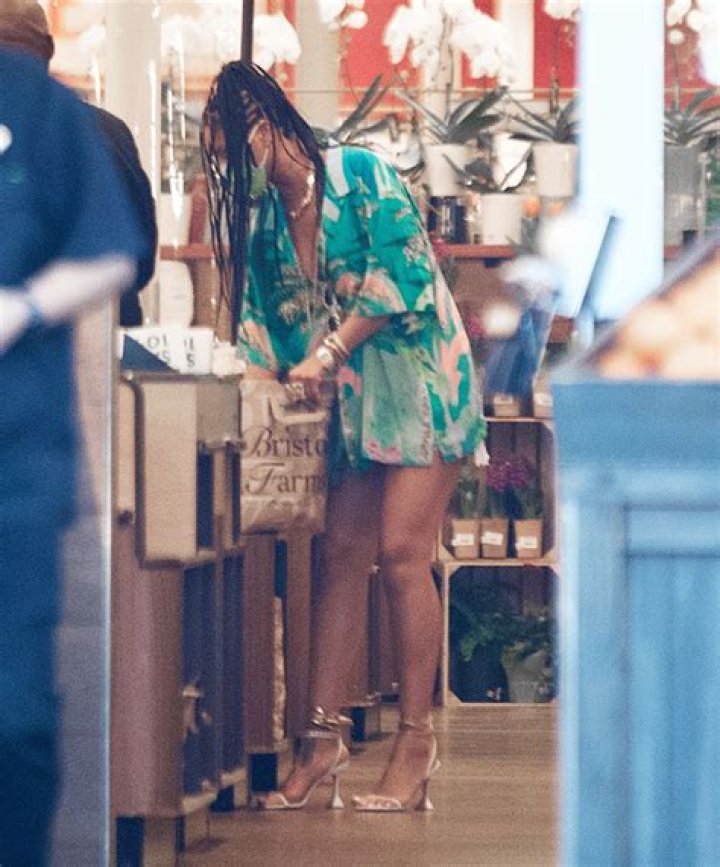 Rihanna Bags Her Own Groceries While Rocking Gorgeous Braids & A Mini Skirt On Shopping Trip