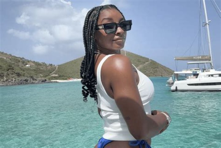 Simone Biles Wears Strapless Peach Swimsuit As She Poses On Tropical Beach: Photos