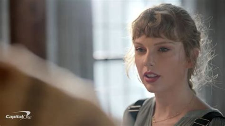 Taylor Swift Rocks French Braid & Bangs For Capital One Ad – Hollywood Life