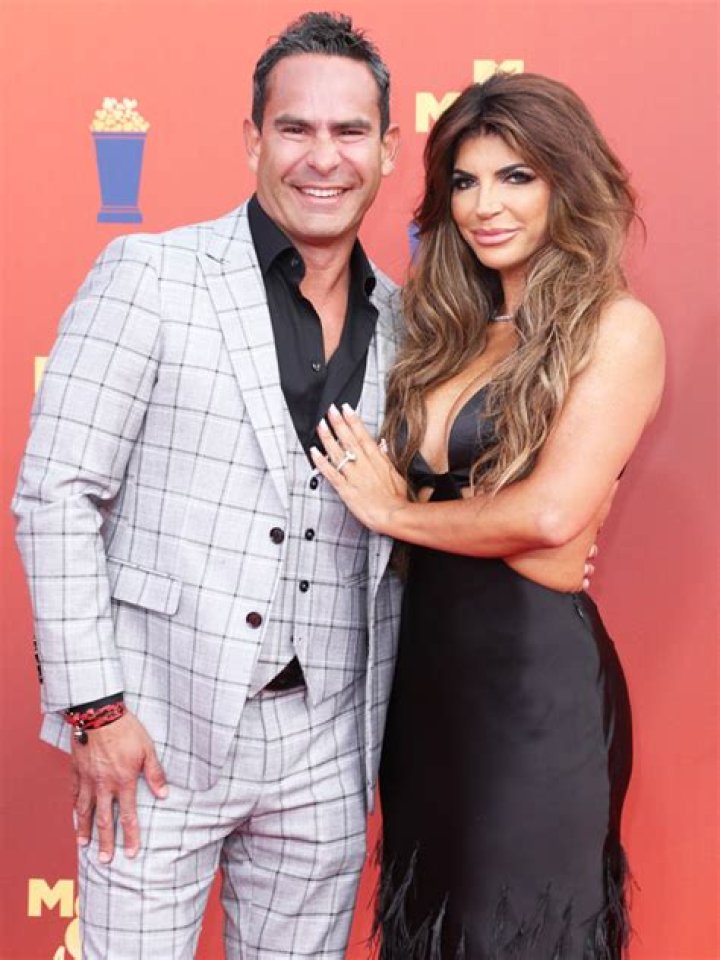 Teresa Giudice Rocks Tiny Orange Bikini & Shares A Kiss With Luis Ruelas In Mykonos: Photos